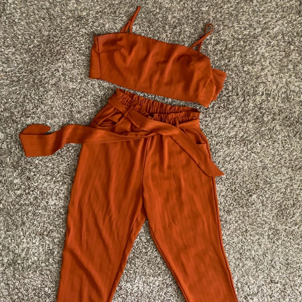 burnt orange jumpsuit!